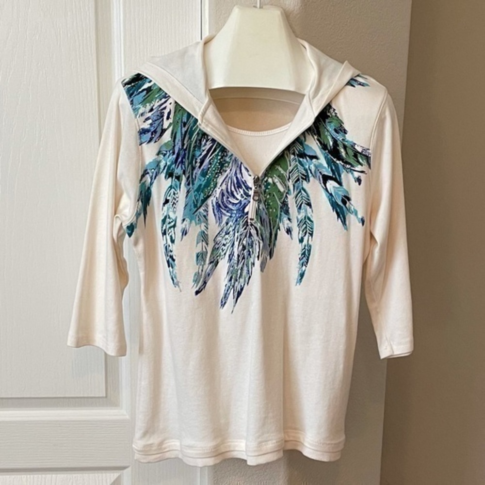 Style & Co. cream hoodie with blue & teal feathers